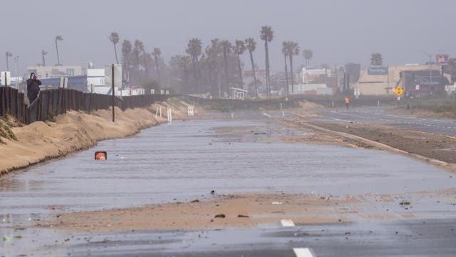 Atmospheric river batters California with flooding rains, wind