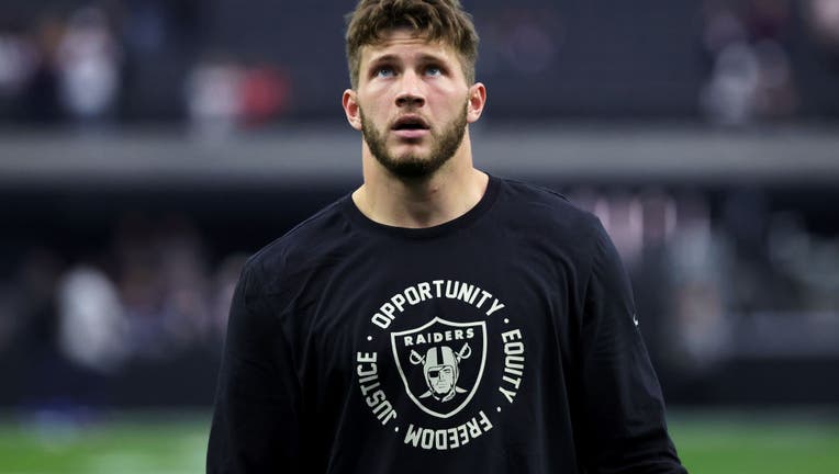 Tight end Foster Moreau #87 of the Las Vegas Raiders warms up before a game against the New England Patriots. (Photo by Ethan Miller/Getty Images)