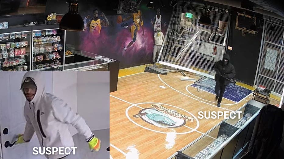 Surveillance image shows two of the three suspects break into the store.