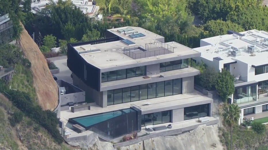 The man who won the $2 billion Powerball last November in Altadena just purchased his very own Hollywood Hills mansion.