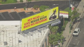 Reggie Bush billboards in LA ask for return of former USC star’s Heisman Trophy