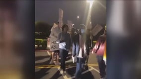 Car drives toward picketing 'Medieval Times' workers in OC