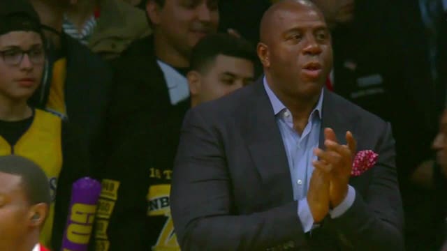 Group including Lakers legend Magic Johnson set to buy NFL's Commanders, report says