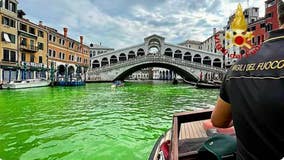 Italian officials stumped after patch of Venice's famed Grand Canal turns fluorescent green