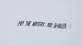 Plane flies NSFW 'pay the writers' banner over Hollywood studios mid-strike