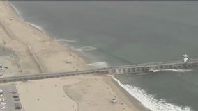 NWS extends beach hazards statement as high tides flood streets, parking lots in Seal Beach