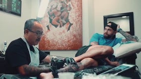Cambodian tattoo artist finds key to freedom