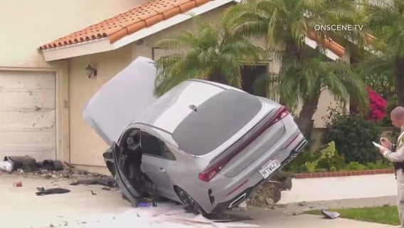 Man accused of threatening 2 with pickaxe after crashing car into Lake Forest house