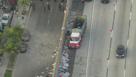 2 hurt, debris rain down on South LA neighborhood after 110 Freeway crash