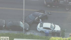 Police chase suspect crashes Tesla in Koreatown, ditches car with wig in hand