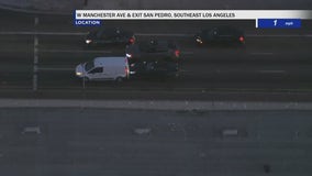 Stolen car suspect gets out of moving car at end of police chase