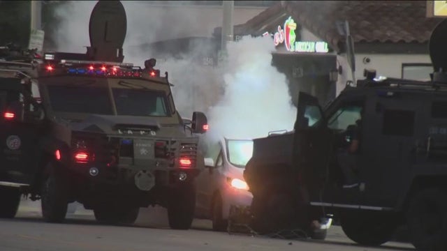 Suspect accused of attempting to run over LAPD officers arrested in Studio City standoff