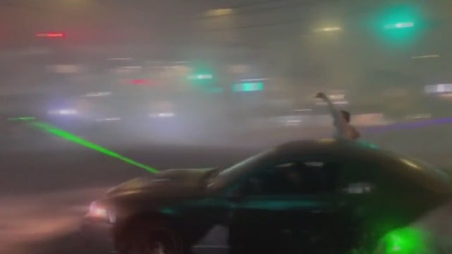 Street takeovers plague LA intersections: Drivers engage in dangerous stunts with fireworks, laser shows