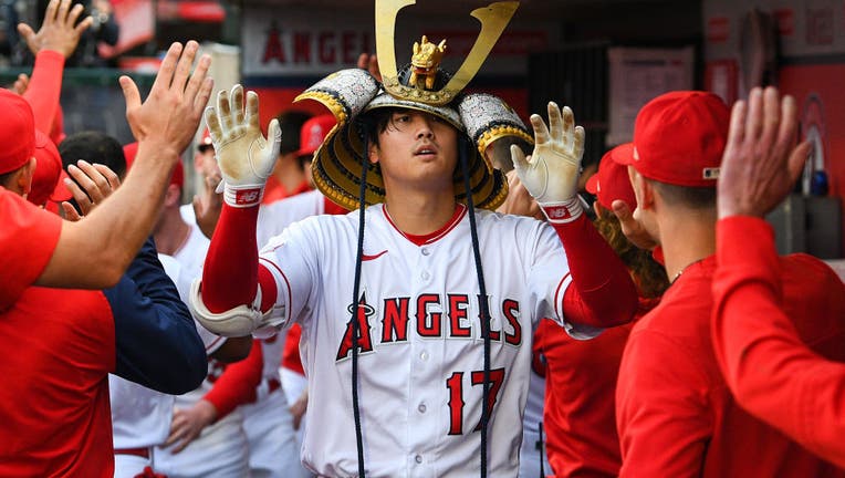 Los Angeles Angels pitcher Shohei Ohtani (17) celebrates in the dugout after his home run during the MLB game between the Seattle Mariners and the Los Angeles Angels of Anaheim. (Photo by Brian Rothmuller/Icon Sportswire via Getty Images)