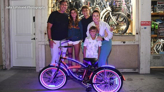 Bike donated to 8-year-old boy with cystic fibrosis ahead of the Glow Ride