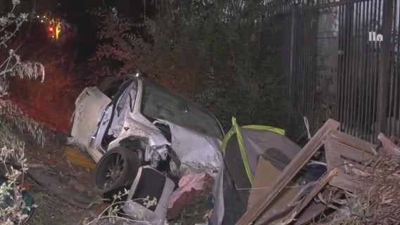 Tesla flies off 10 Freeway in Los Angeles, crashes into homeless encampment below