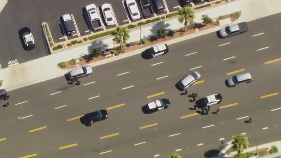 Police chase involving suspected bank robbers ends in hours-long standoff near Angel Stadium