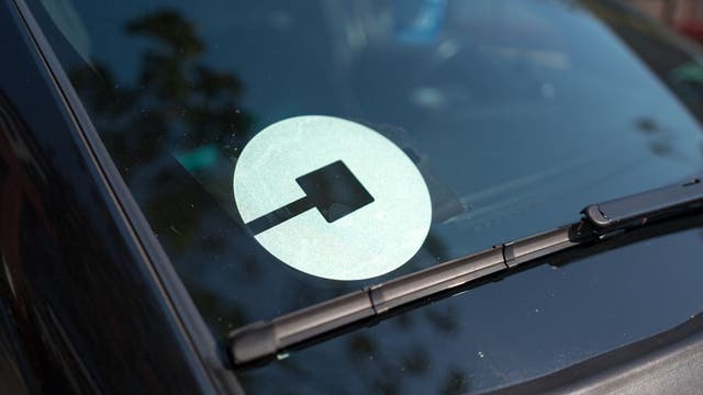 Uber driver stabbed couple over vomiting in her car, lawsuit says