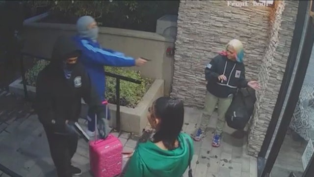 Surveillance video shows LA exotic dancers being robbed at gunpoint