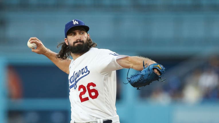 Tony Gonsolin #26 of the Los Angeles Dodgers pitches in the first inning against the Miami Marlins at Dodger Stadium on August 18, 2023 in Los Angeles, California. (Photo by Meg Oliphant/Getty Images)