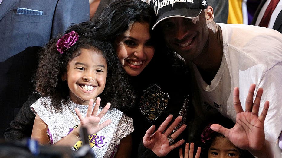 Kobe Bryant #24 of the Los Angeles Lakers poses with his wife and daughters, left to right, Natalia, Vanessa and Gianna, after the Lakers defeated the Boston Celtics in Game Seven of the 2010 NBA Finals at Staples Center on June 17, 2010 in Los Angeles, California. (Photo by Christian Petersen/Getty Images)