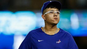Julio Urías placed on leave after felony domestic violence arrest