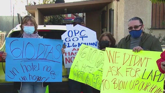 Victims of botched LAPD fireworks explosion protest outside Bass' home