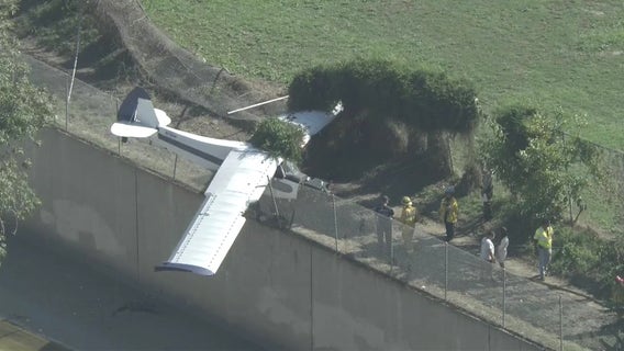 Small plane stuck on fence in Compton
