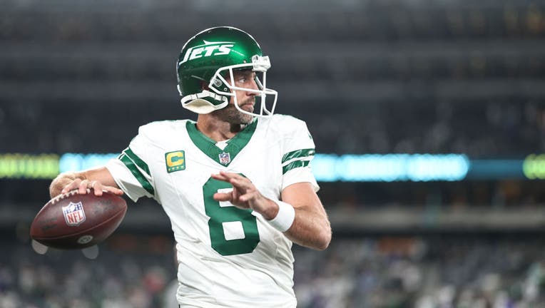 Aaron Rodgers #8 of the New York Jets passes as he warms up prior to a game against the Buffalo Bills at MetLife Stadium on September 11, 2023 in East Rutherford, New Jersey. (Photo by Michael Owens/Getty Images)
