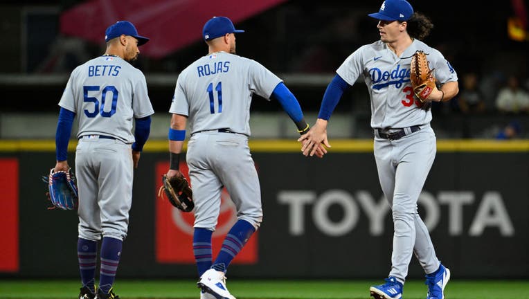 Dodgers clinch 2023 NL West title with 6-2 extra-inning win against Mariners