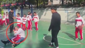Flagrant foul: Newsom 'plows through a small child' during pickup basketball game in China