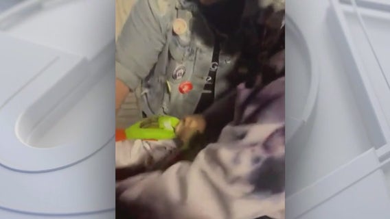 2 people take down posters showing Hamas kidnapping victims on USC campus