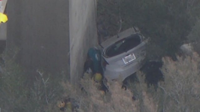 Mini Cooper flies off bridge in Angeles National Forest