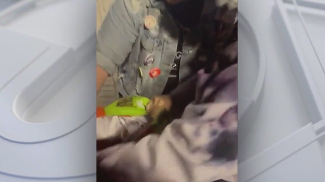 2 people take down posters showing Hamas kidnapping victims on USC campus