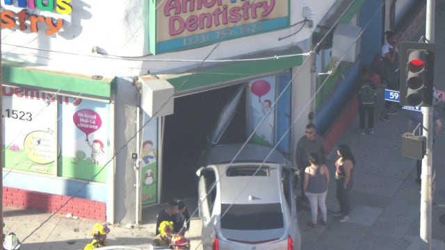 Several hurt after Cadillac smashes into a South LA kids' dental office