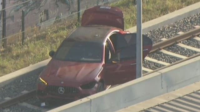 Mercedes-Benz leads police chase across LA, ditches car on train tracks