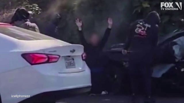 Apparent California freeway robbery caught on camera
