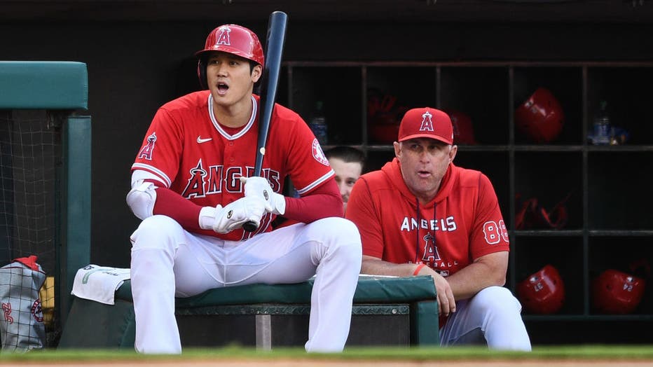 Los Angeles Angels designated hitter Shohei Ohtani (17) looks on with interim manager Phil Nevin. (Photo by Brian Rothmuller/Icon Sportswire via Getty Images)