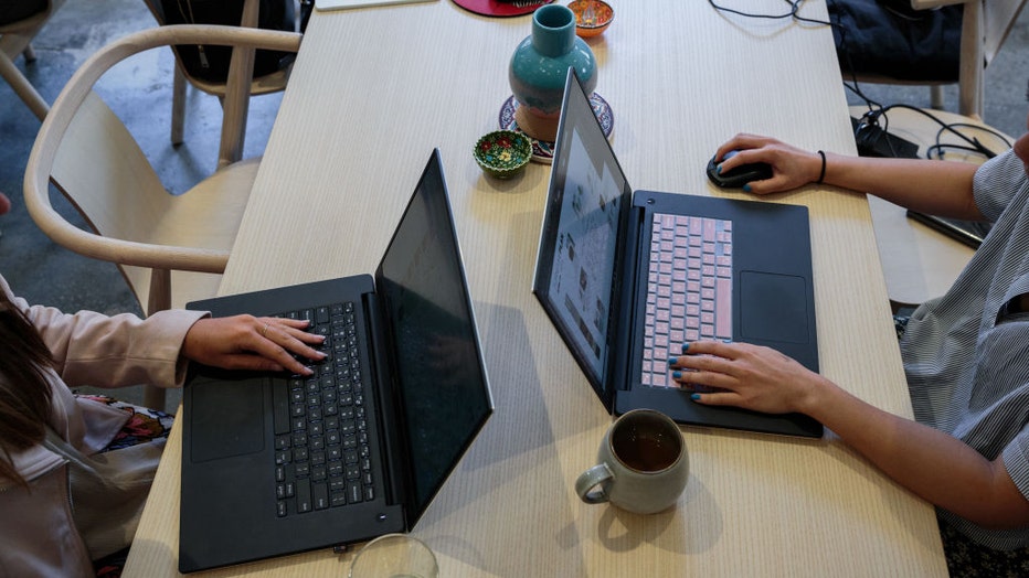 People-work-at-laptops-in-office.jpg