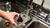 Mother of 2 dies after drinking too much water while medical staff was distracted by phones, inquest finds