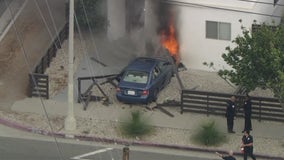 Vehicle erupts in flames after pursuit driver crashes into South LA home