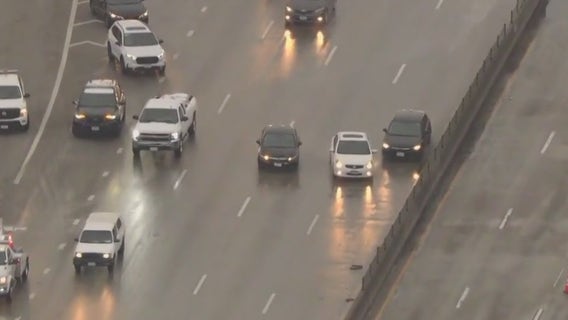 VIDEO: Driver pulls dangerous stunt on flooded lane on 10 Freeway