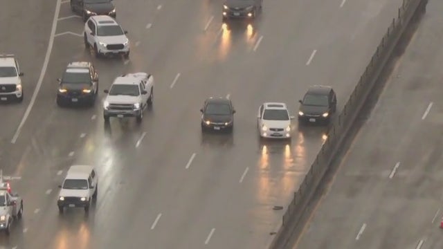 VIDEO: Driver pulls dangerous stunt on flooded lane on 10 Freeway