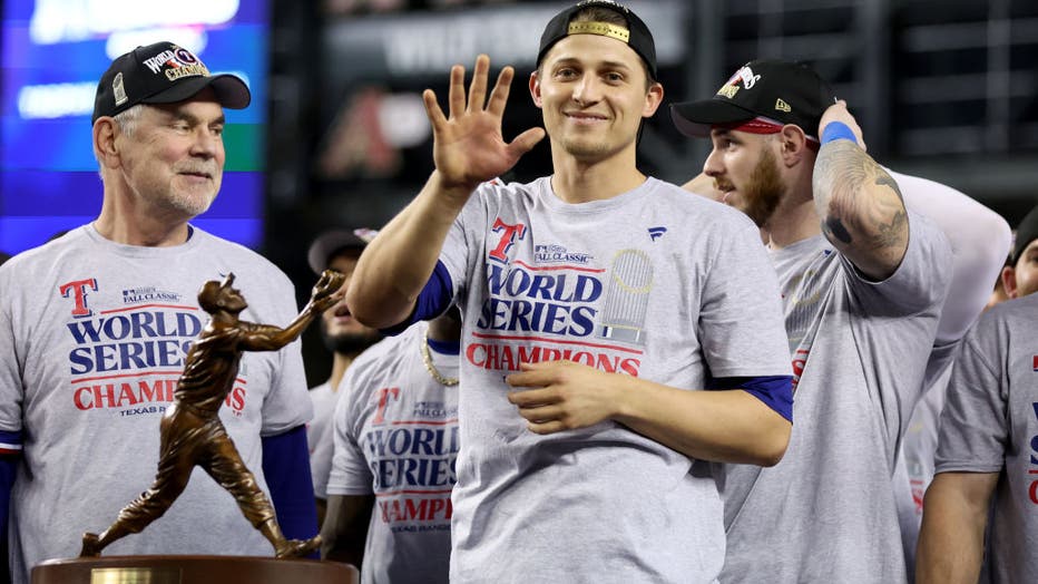 Corey Seager #5 of the Texas Rangers celebrates after the Texas Rangers beat the Arizona Diamondbacks 5-0 in Game Five to win the World Series at Chase Field on November 01, 2023 in Phoenix, Arizona. (Photo by Christian Petersen/Getty Images)