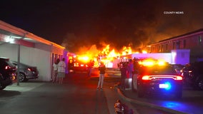 Massive carport fire destroys 13 cars in Tustin