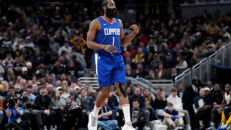 James Harden #1 of the Los Angeles Clippers celebrates after making a shot in the fourth quarter against the Indiana Pacers at Gainbridge Fieldhouse on December 18, 2023 in Indianapolis, Indiana. (Photo by Dylan Buell/Getty Images)