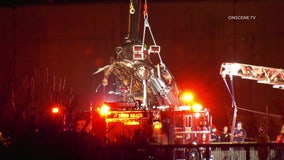 Long Beach crash sends car flying into canal; 2 killed