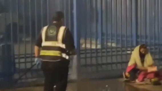 Homeless person in LA appears to get hosed by nonprofit worker spraying Skid Row sidewalk