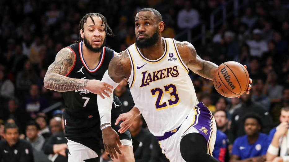 LeBron James #23 of the Los Angeles Lakers drives to the basket against Amir Coffey #7 of the Los Angeles Clippers in the second quarter at Crypto.com Arena on January 07, 2024 in Los Angeles, California. (Photo by Meg Oliphant/Getty Images)