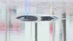 Cars submerged in water in Long Beach as atmospheric river brings major flooding